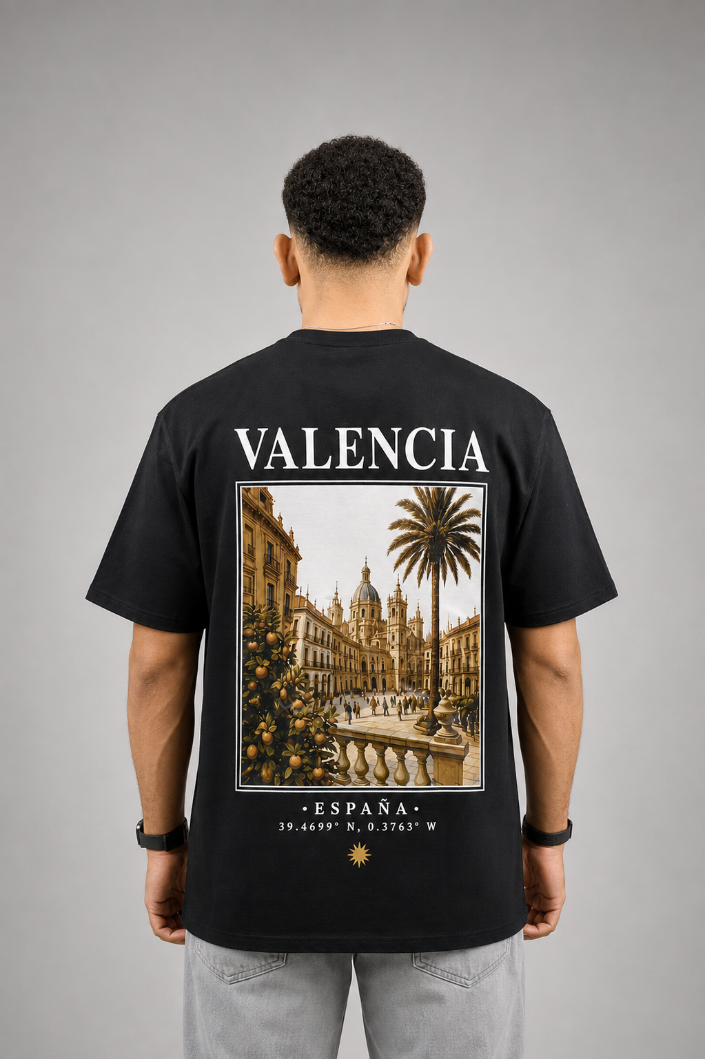 Black AUREO Valencia oversized tee, back view, Showing the city of Valencia