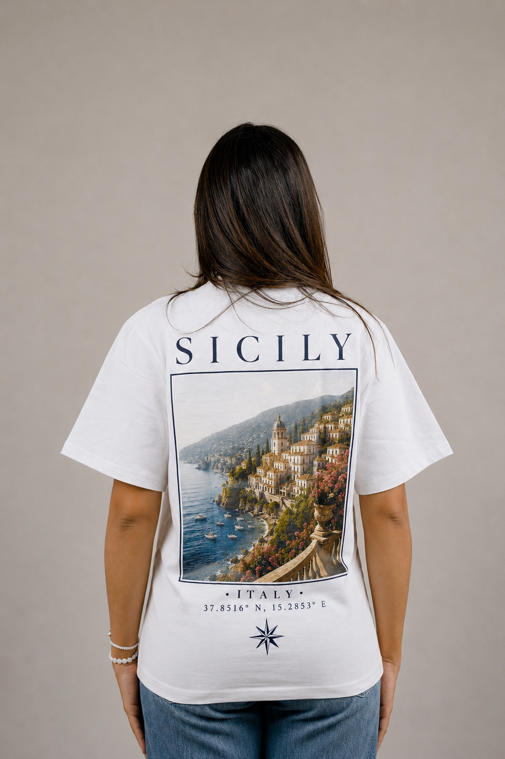 White AUREO Sicily oversized tee, back view, showing the City of Sicily
